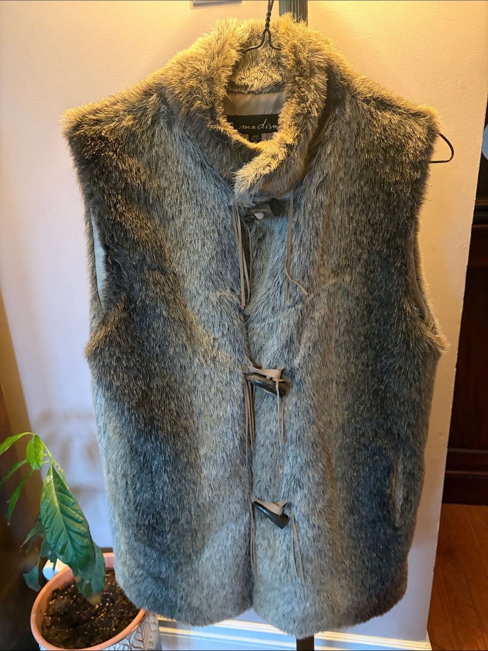 Madison Faux Fur Vest With Unique Antler-like and Leather Detailed Front Closure